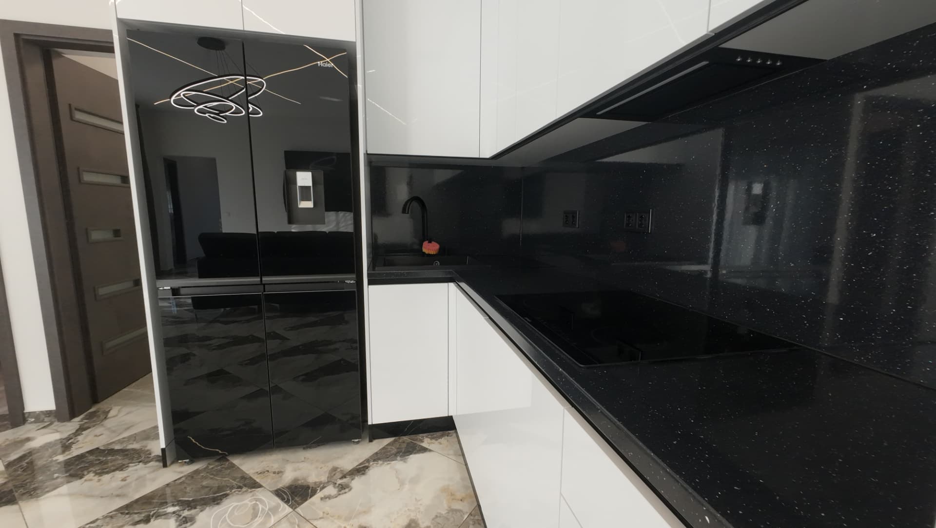 Modern kitchen with a black countertop